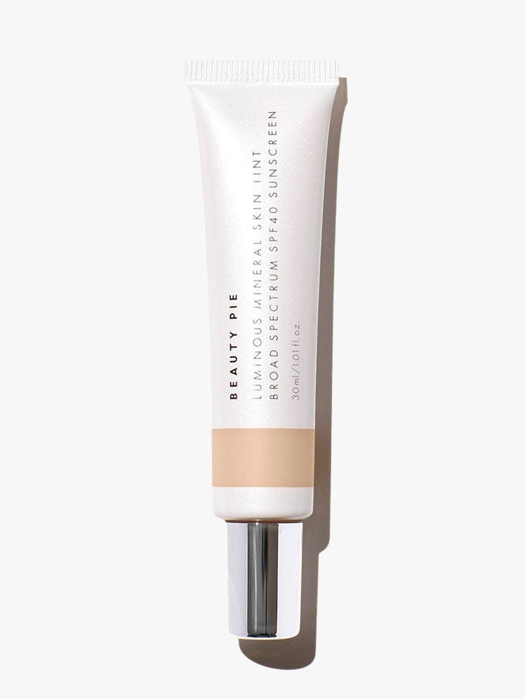 Beauty Pie Luminous Mineral Skin Tint SPF 40 white tube with silver cap on light gray background