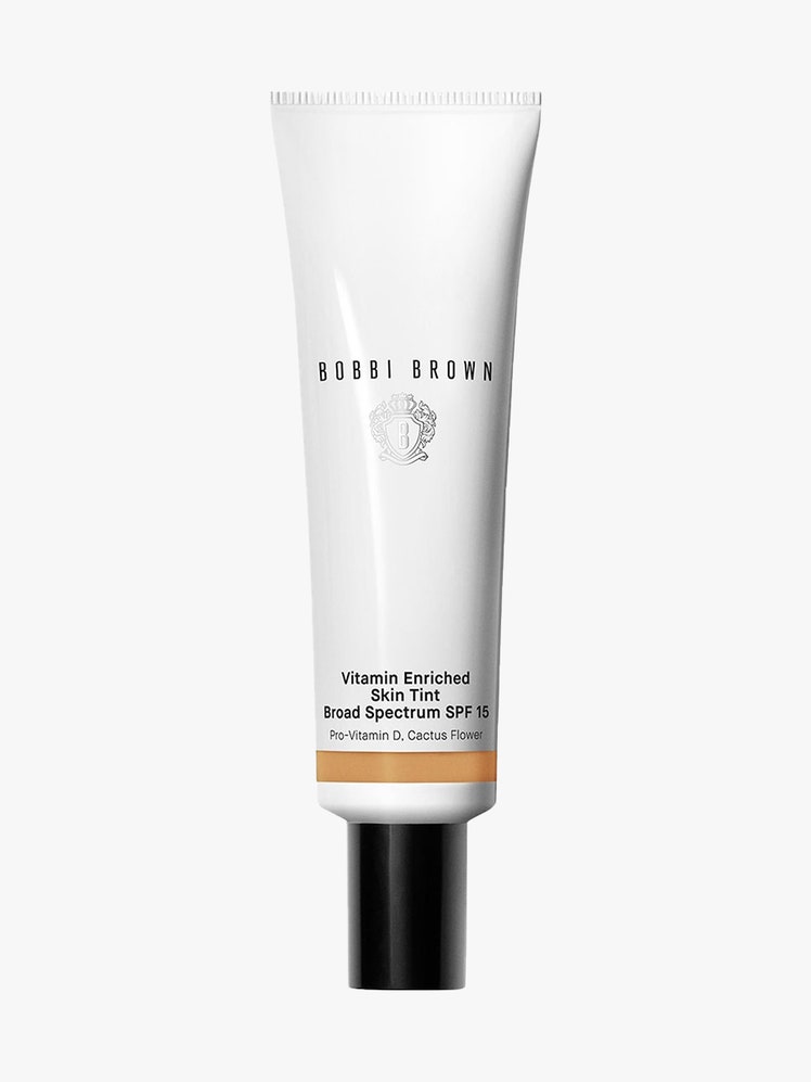 Bobbi Brown Vitamin Enriched Hydrating Skin Tint white tube with black cap on light gray background