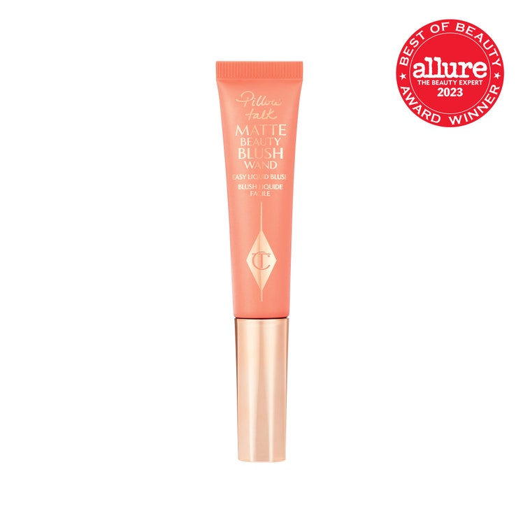 Charlotte Tilbury Pillow Talk Matte Beauty Blush Wand peach tube with gold cap on white background with red Allure BoB...