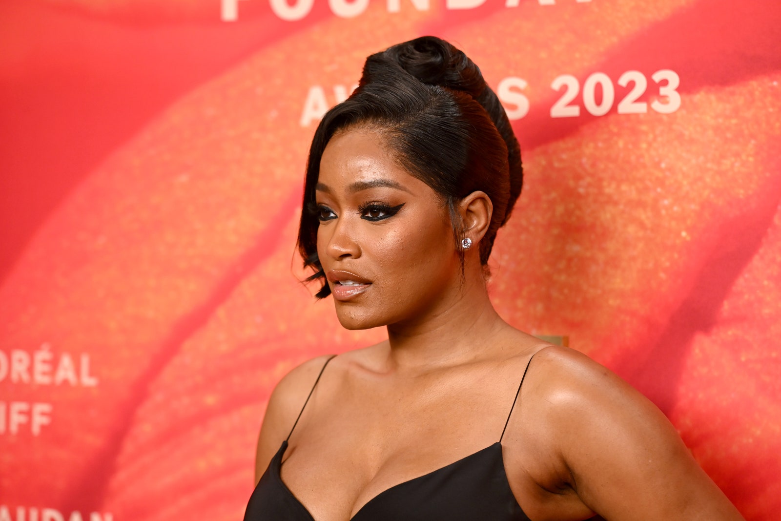 Keke Palmer wearing a French roll hairstyle