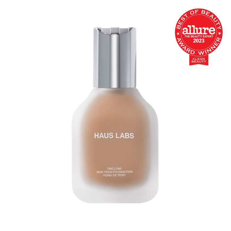 Haus Labs by Lady Gaga Triclone Skin Tech Foundation cloudy transparent trapezoid bottle of foundation with silver cap...