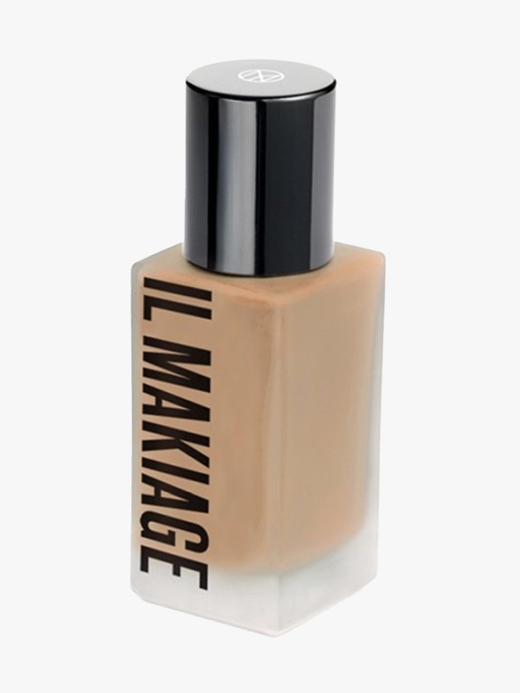 Il Makiage I Woke Up Like This Flawless Base Foundation bottle of foundation with shiny black cap on light gray background