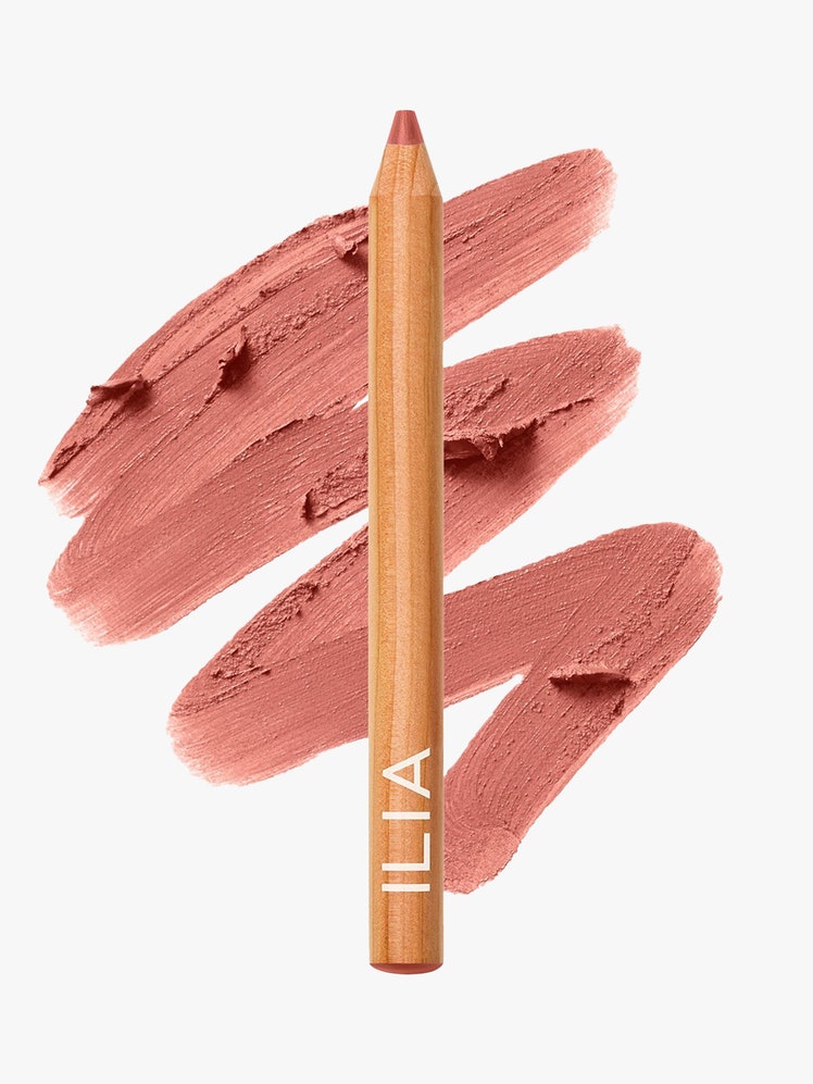 Ilia Lip Sketch Crayon wood and nude pink lip crayon with squiggle swatch behind it on light gray background