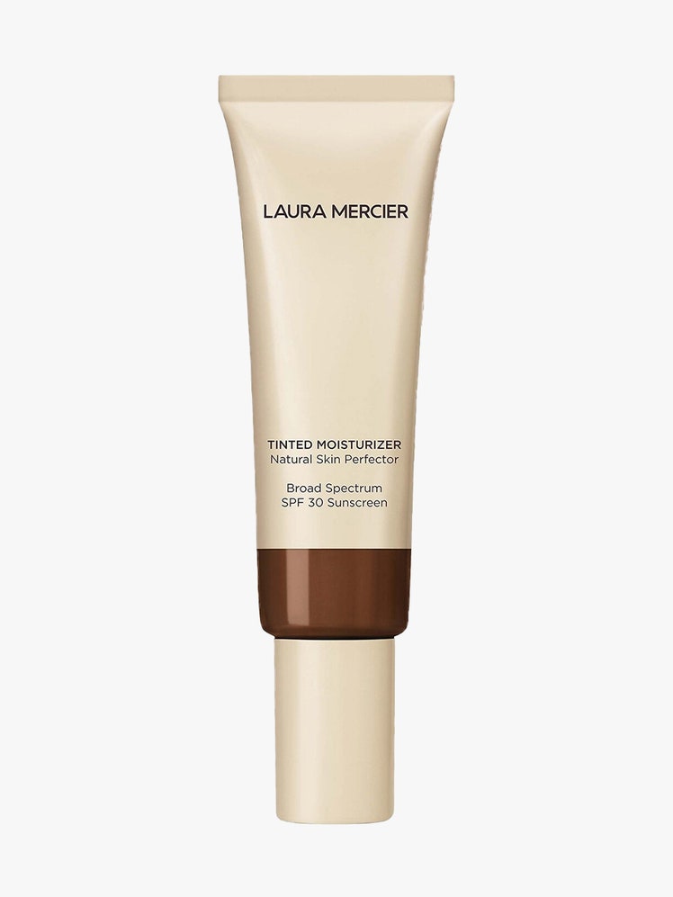Laura Mercier Tinted Moisturizer Natural Skin Perfector Broad Spectrum SPF 30 pale yellow tube with transparent window on light gray background