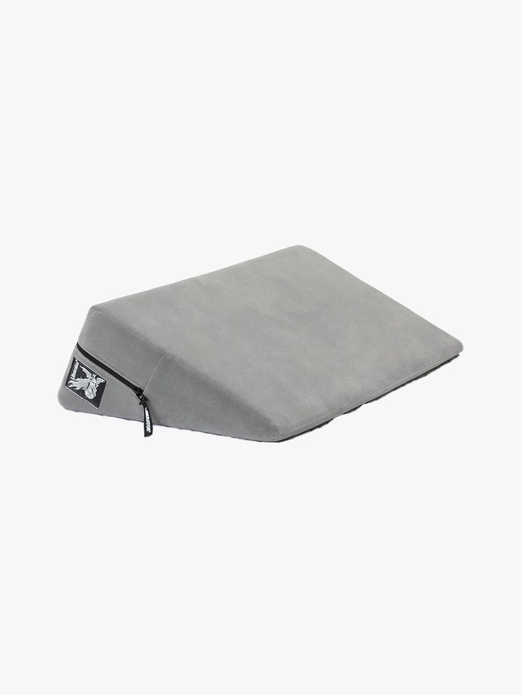 Liberator Wedge gray triangle sex pillow on light gray background