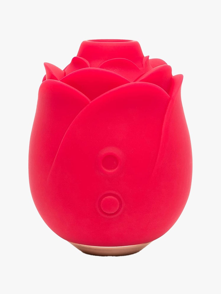 Lovehoney Rose Clitoral Suction Stimulator red rose vibrator toy on light gray background