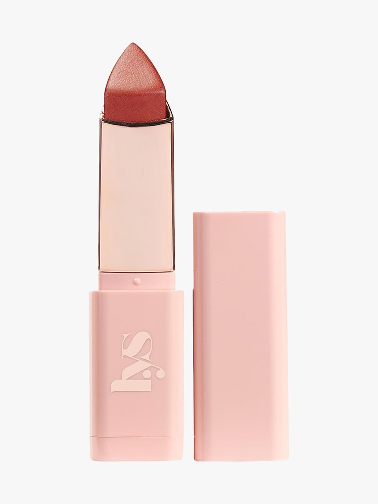 LYS Beauty Higher Standard Cream Glow Blush Stick pink triangular twist up stick of brick red blush with cap to the side on light gray background