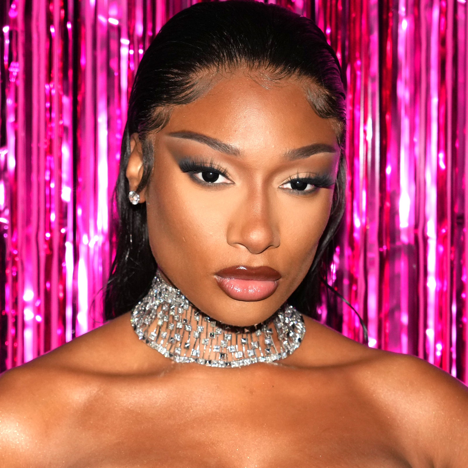 Megan Thee Stallion's New Merch Is Cute, But I'm Looking at Her Curls