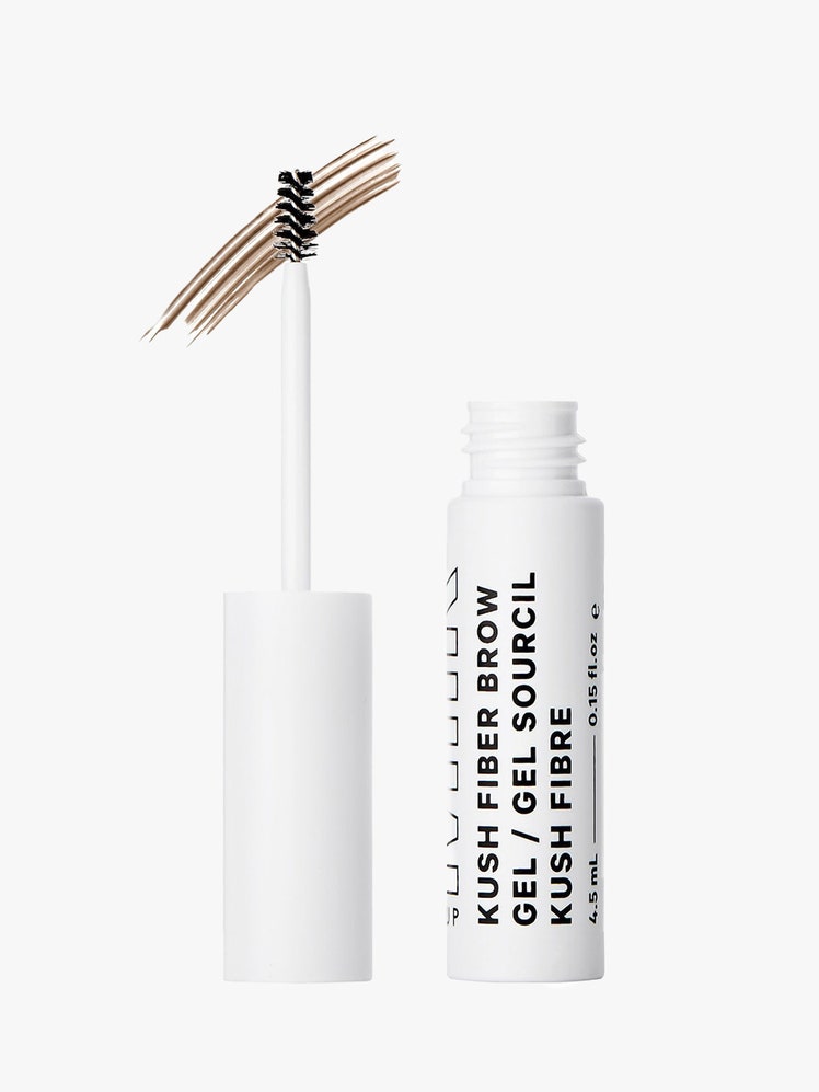 Milk Kush Fiber Eyebrow Gel white tube with swatch on light gray background
