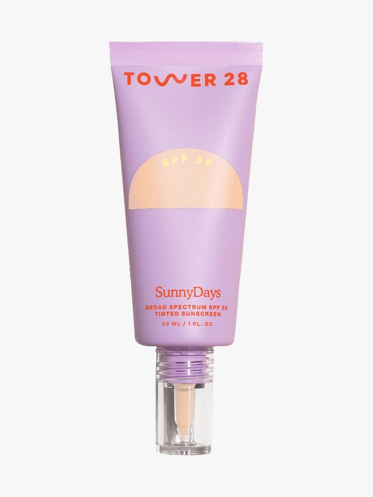 Tower 28 Beauty SunnyDays SPF 30 purple tube on light gray background