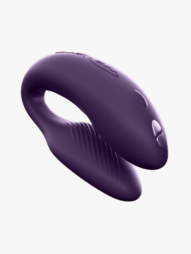 We-Vibe Chorus purple U-shaped vibrator on light gray background