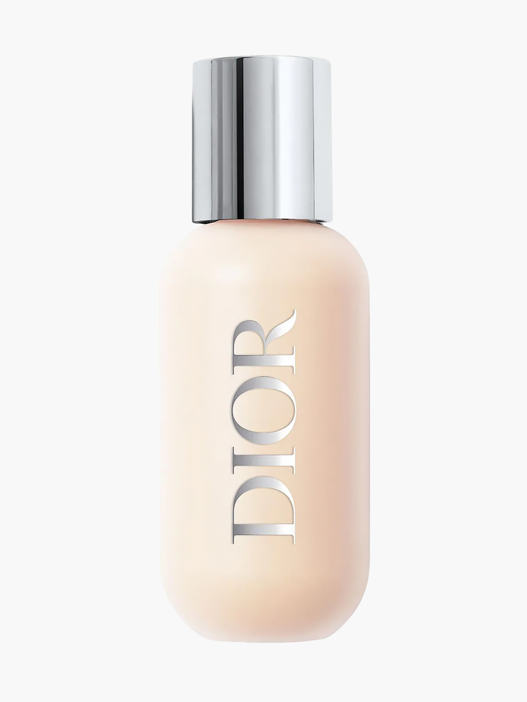 Backstage Face & Body Foundation in branded clear bottle with silver cap on light gray background