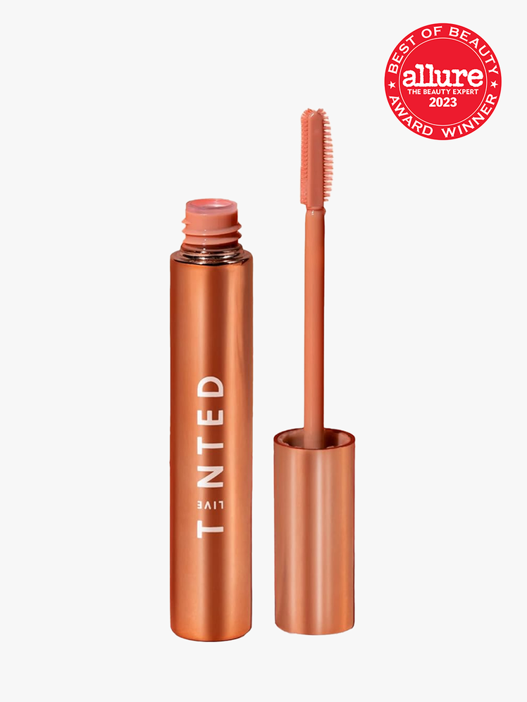 Live Tinted Huebrow Clear Setting Eyebrow Gel in bright orange tube