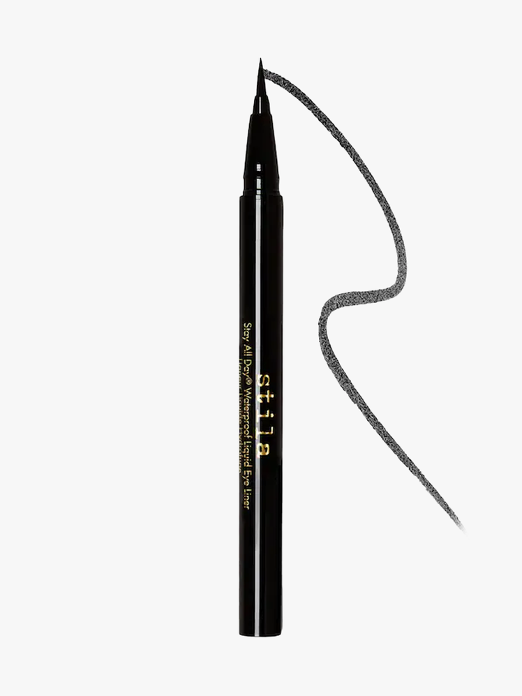 stila Stay All Day® Waterproof Liquid Eye Liner branded component in black with gold accents on a light gray background