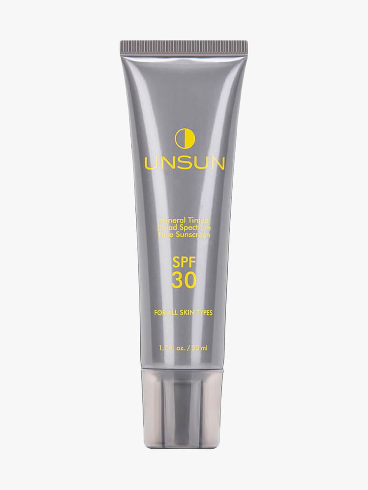 Unsun Mineral Tinted Sunscreen SPF 30 in silver branded tube on light gray background